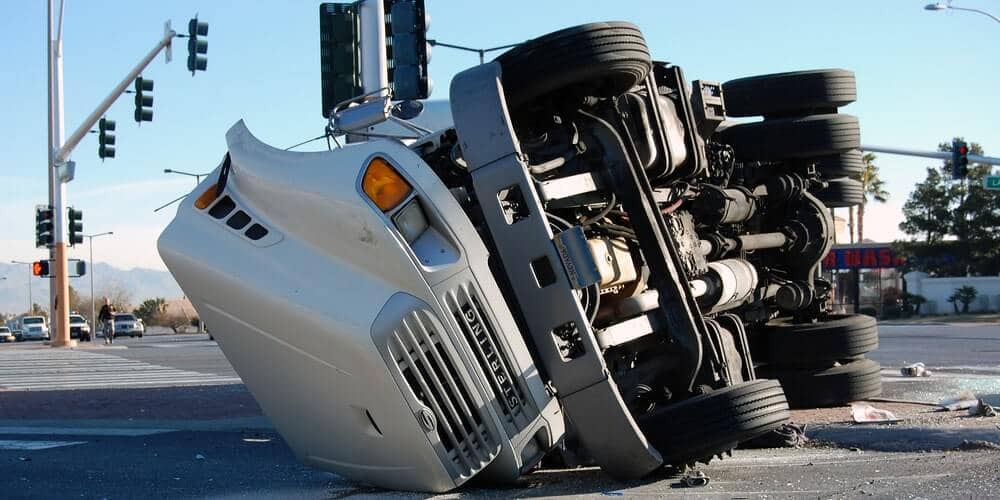 Photo of Truck Fallen On Side